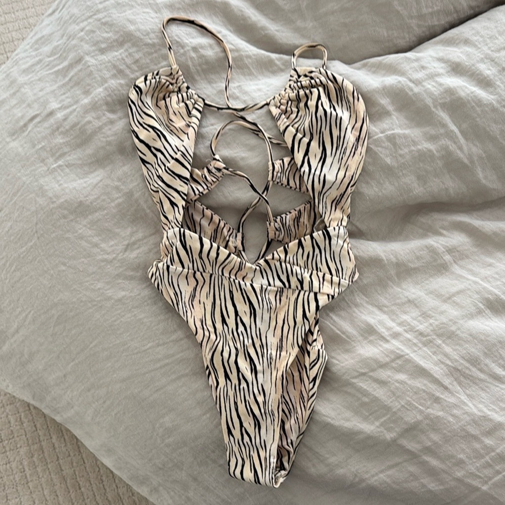 Animal print cut out one piece by For Love and Lemons